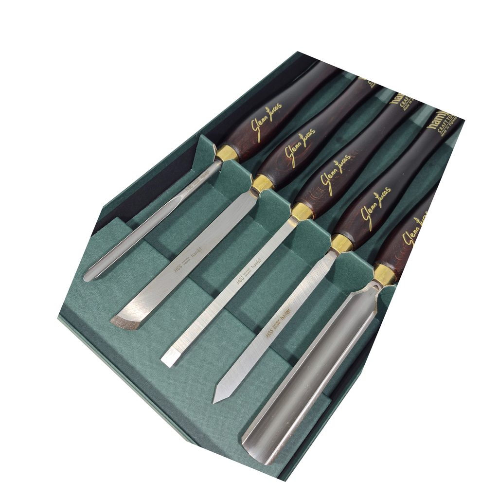 set of five woodturning chisels with high speed steel blades and wooden handles in a presentation box