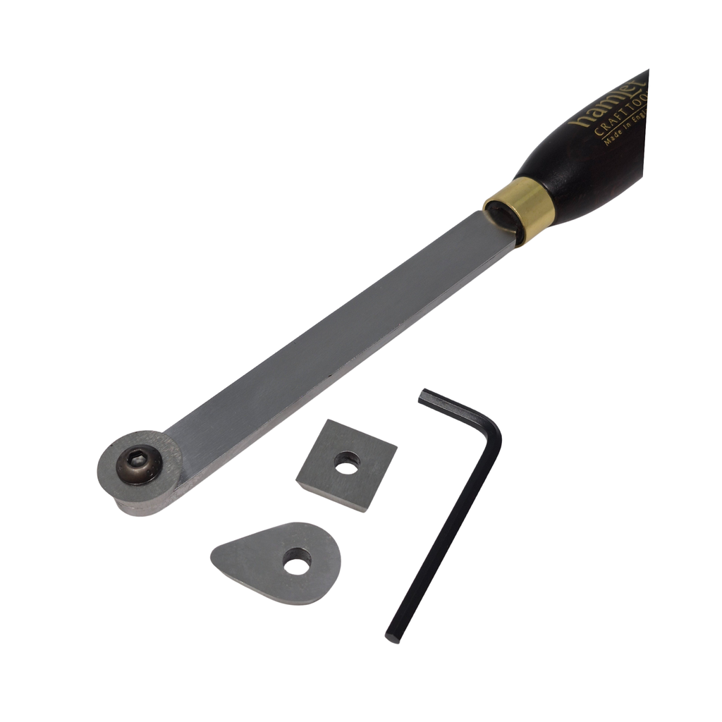 close up of high speed steel woodturning scraper with three tips, allen key and wooden handle on a white background