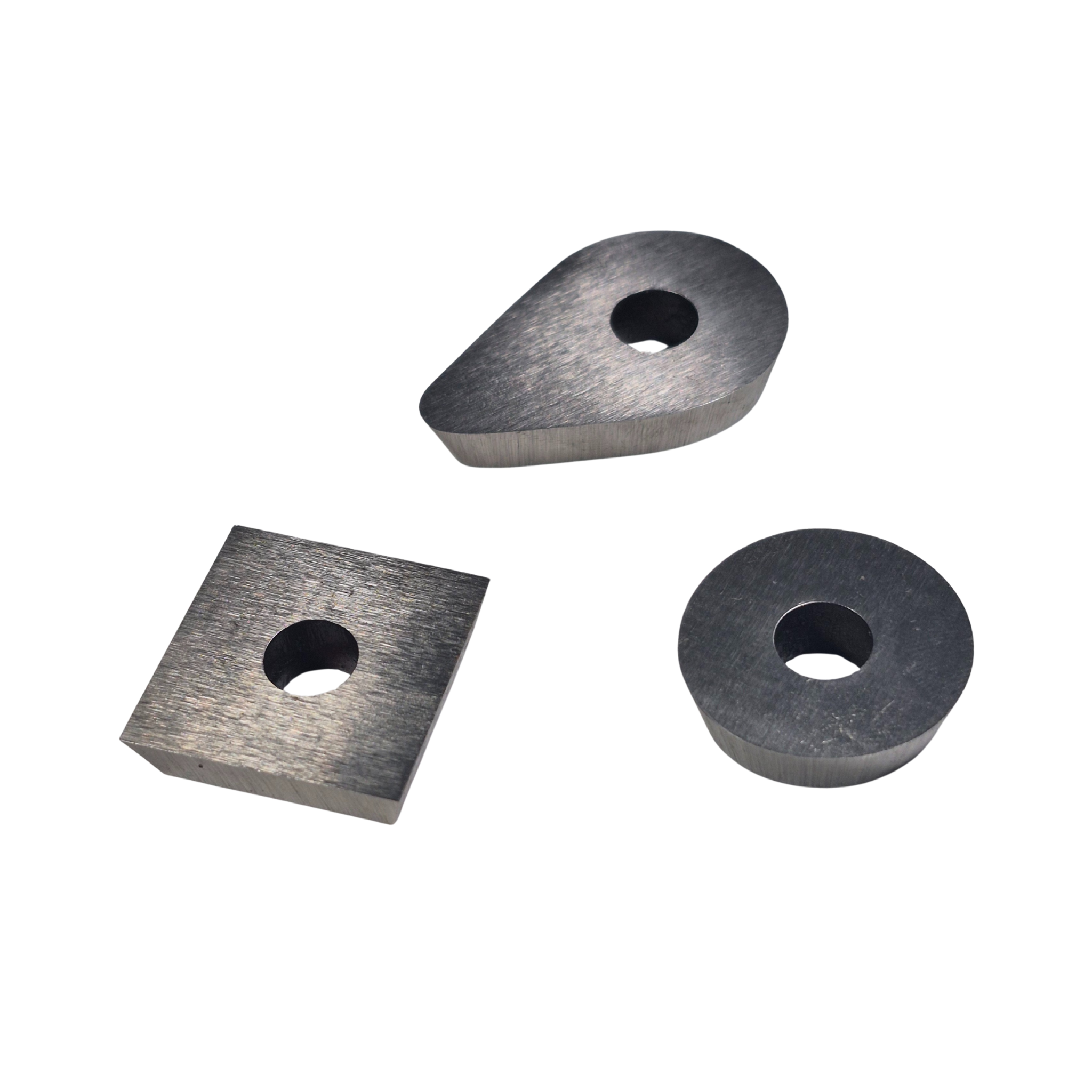 three high speed steel scraper tips in different shapes on a white background