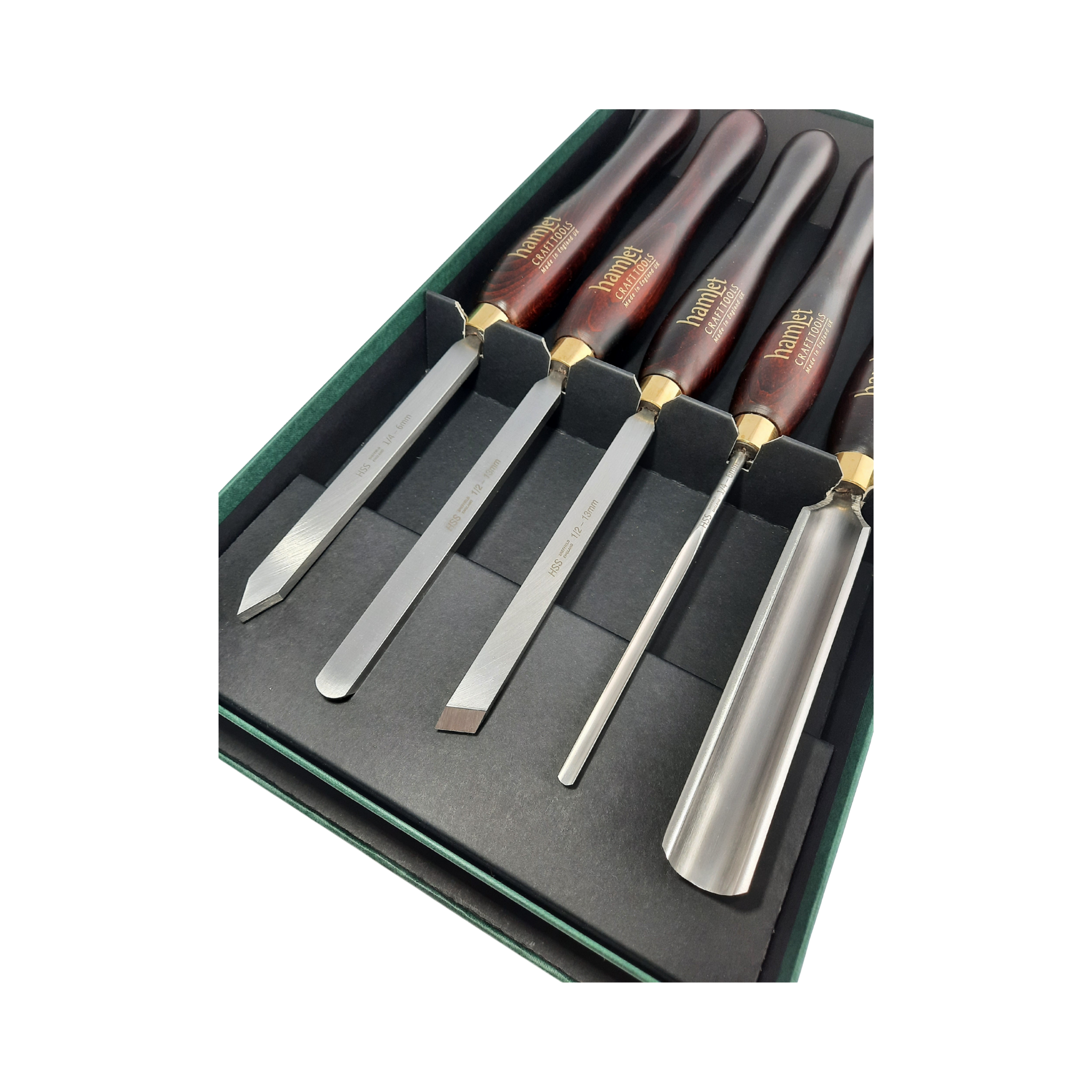 close up of a set of five high speed steel woodturning chisels with wooden handles in a presentation box