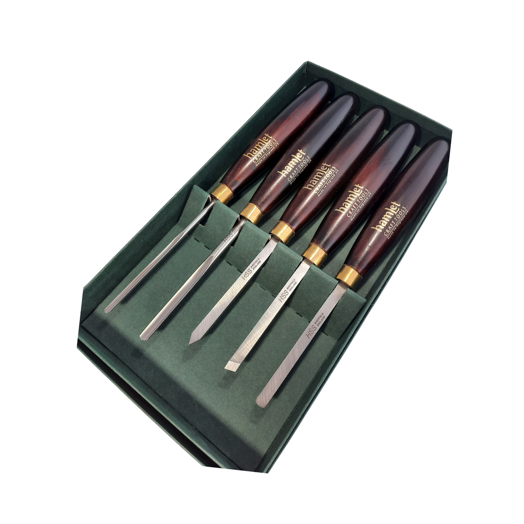 set of five mini woodturning chisels with high speed steel blades and wooden handles in a presentation box