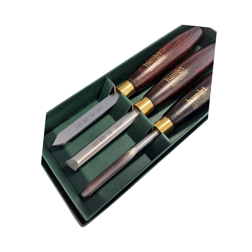 set of three mini woodturning chisels with high speed steel blades and wooden handles in a presentation box