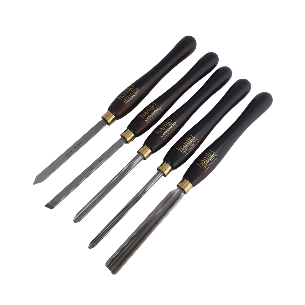 set of five woodturning chisels with high speed steel blades and wooden handles on a white background