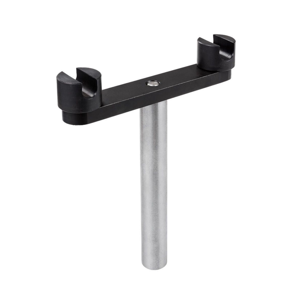 black metal bracket attached to a  round steel shaft on a white background