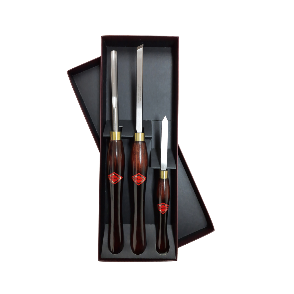 set of three woodturning chisels with high speed steel blades and wooden handles in a presentation box