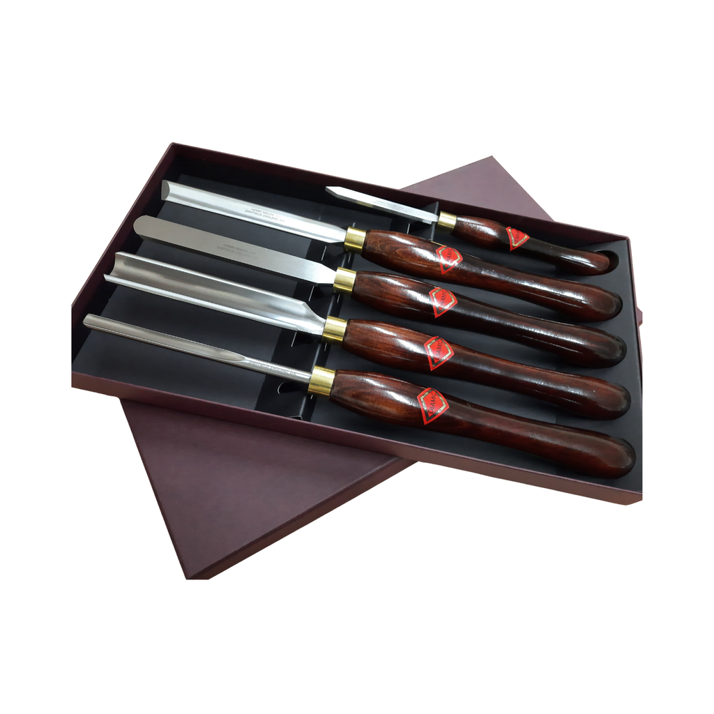 set of five woodturning chisels with high speed steel blades and wooden handles in an open presentation box