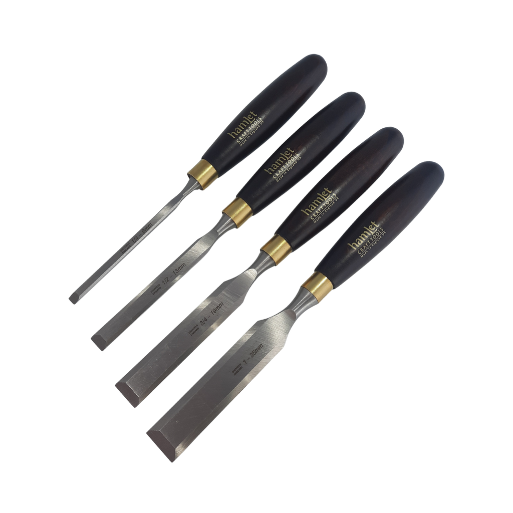 set of four wooden-handled firmer chisels with 'Hamlet' branding and steel blades on a white background